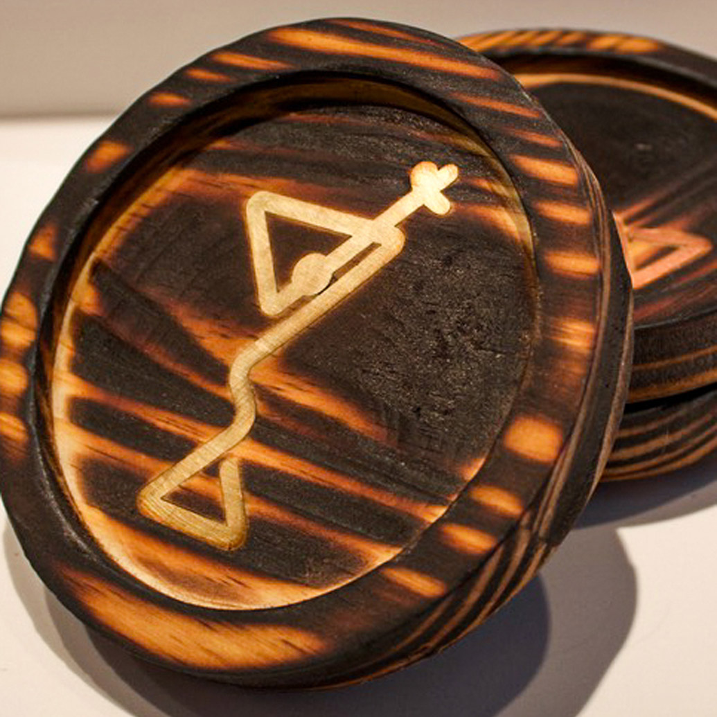 Wooden coasters with a gold martini inlay